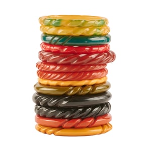 Collection of Thirteen Carved Bakelite Bracelets