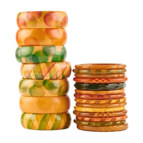 Collection of Twenty-One Carved and Painted Bakelite Bracelets