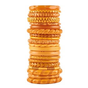 Collection of Carved Butterscotch Bakelite Bracelets