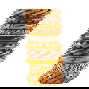 Collection of Ten Carved Earth Tone Bakelite Bracelets: Collection of Ten Carved Earth Tone Bakelite Bracelets. The carved and painted bangles ranging in width from 25 mm to 12 mm.