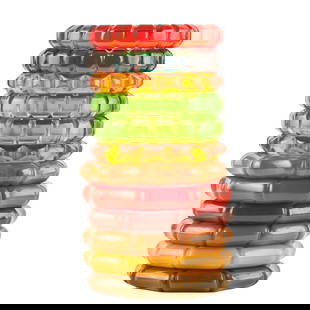 Collection of Twelve Carved Multicolored Bakelite Bracelets: Collection of Twelve Carved Multicolored Bakelite Bracelets