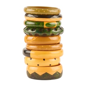 Collection of Nine Carved Bone, Green and Black Bakelite Bracelets