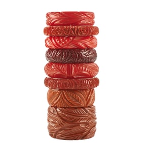 Collection of Eight Heavily Carved Red Bakelite Bracelets