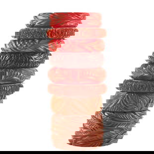 Collection of Eight Heavily Carved Red Bakelite Bracelets: Collection of Eight Heavily Carved Red Bakelite Bracelets. Ranging in width from approximately 50 mm to 17 mm. Please note: Lots 3329 through 3377 are from a single private collection. Some lots may c