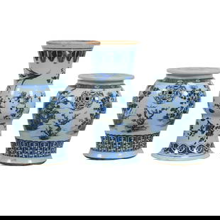 Three Chinese Blue and White Porcelain Stools and Vase: Comprising a pair of garden stool with compressed globular shape, the surface painted with auspicious symbols, flowers, tress, and lappet bands,;the side and the top reticulated with ancient coin shap