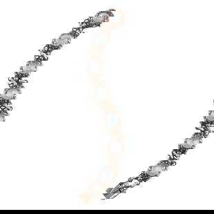 Georg Jensen Moonstone, Sterling Silver Bracelet: Georg Jensen Moonstone, Sterling Silver Bracelet. Featuring seven round shaped moonstone cabochons measuring approximately 9.5 mm, set in a sterling silver leaf motif mounting measuring approximately