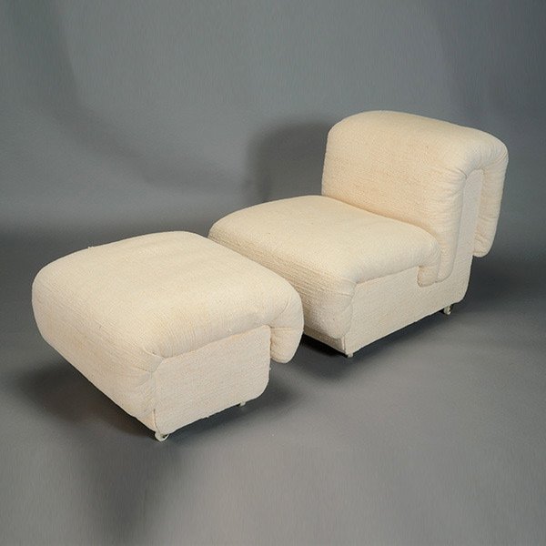 Paul Evans Chair and Ottoman.: Paul Evans Chair and Ottoman. Fully upholstered seat and ottoman on casters. Chair measures approximately 28 inches in back height, 25 inches in width, 41 inches in depth. Ottoman measures approximate