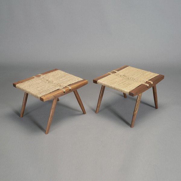 Pair of George Nakashima Grass Seat Foot Stools.: Pair of George Nakashima Grass Seat Foot Stools. Measures approximately 13 inches in height, 18 inches in length, 16 inches in width.
