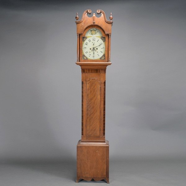 Victorian Longcase Clock: Victorian Longcase Clock. The rectangular hood with broken arched molded cornice with twin bull's eye roundels, raised on gilt mounted columns enclosing an arched door and glazed sides, surmounted by