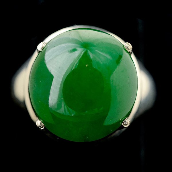 JADE, SILVER RING.: JADE, SILVER RING. Featuring one round jadeite cabochon measuring approximately 15.5 x 14.8 x 5.8 mm, set in a silver mounting. Accompanied by a Mason Kay Report #130219-1 spc, dated February 19, 2013