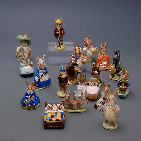 18 Beswick and Royal Doulton Beatrix Potter Figures: Eighteen Beswick Beatrix Potter and Royal Doulton Bunnykins Figures: Comprising Warne & Co. Flopsy Mopsie & Cottontail; Mrs. Rabbit & Bunnies; Peter Rabbit; Mrs. Rabbit (2); Little Black Rabbit; Mr. B