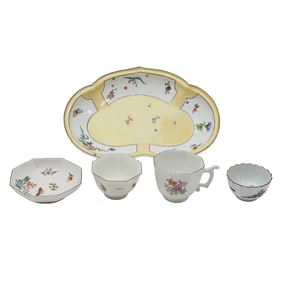 Four Chelsea Porcelain Tablewares and a London Decorated Teabowl
