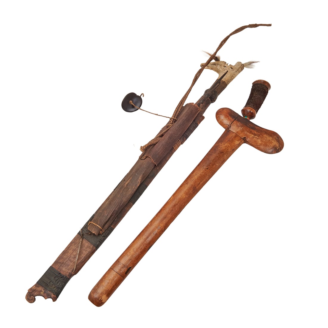 Two Borneo Dayak Mandau Swords with Sheaths: Two Borneo Dayak Mandau Swords with Sheaths.; Comprising example with inlaid blade, woven grip, hooked carved bone pommel, the sheath with applied carvings and woven handle; example with corroded blad