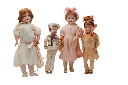 Four Bisque Head Dolls including Armand Marseille in Sailor Dress