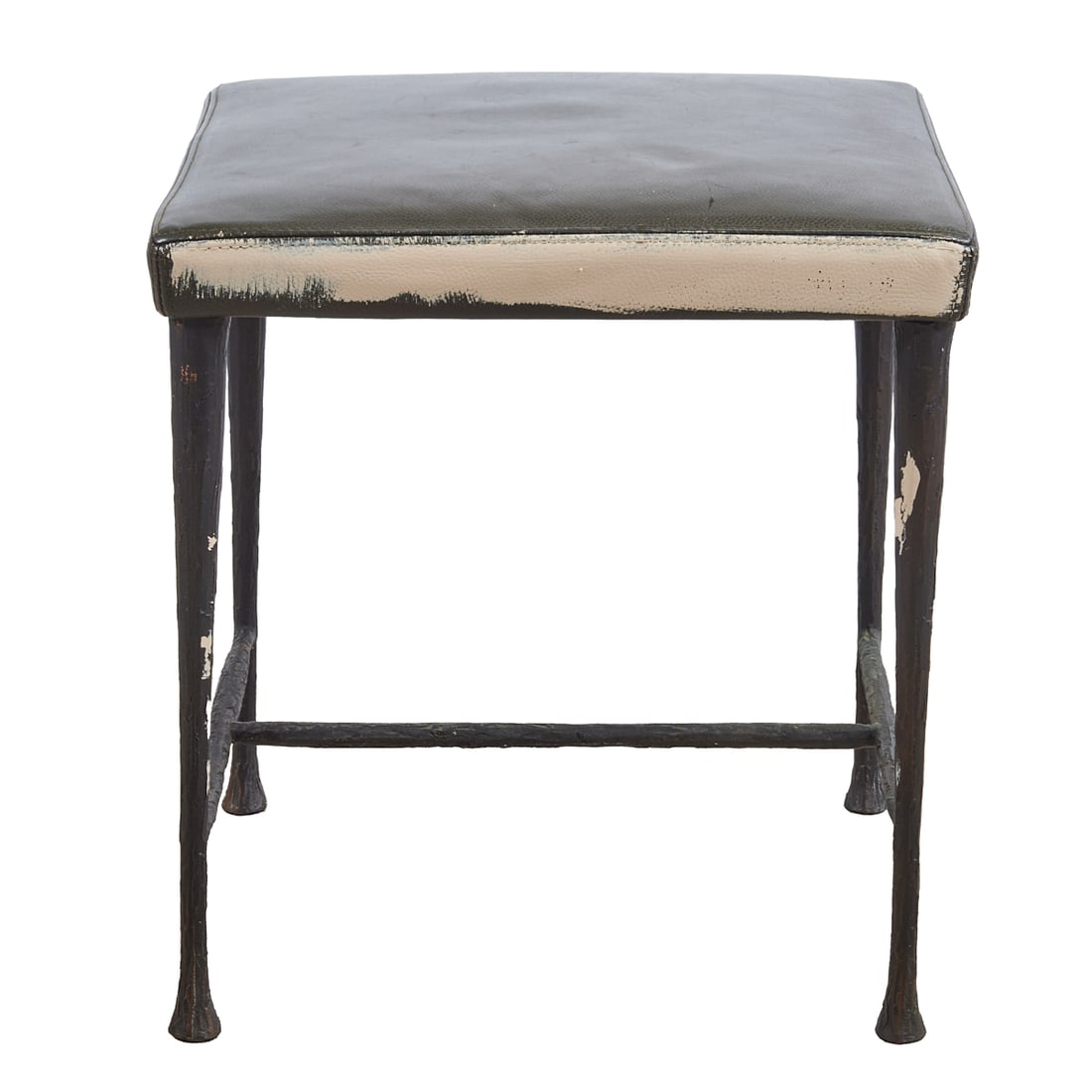 Christian Liaigre for Holly Hunt Bronze and Leather Stool: Christian Liaigre for Holly Hunt Bronze and Leather Stool.; Very dark brown/gray pebble grain;leather seat, roughly formed bronze base with round tapered legs and bar stretcher.; The underside metal i