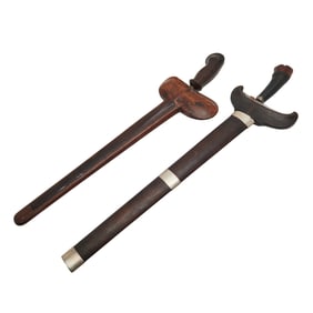 Two Moro Kris Swords in Sheaths Including Damascus Steel