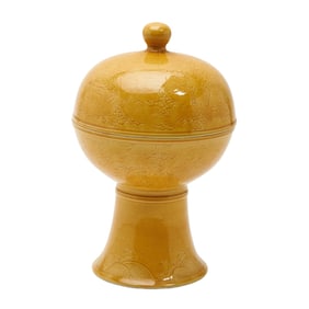 Chinese porcelain covered bowl with a yellow glaze
