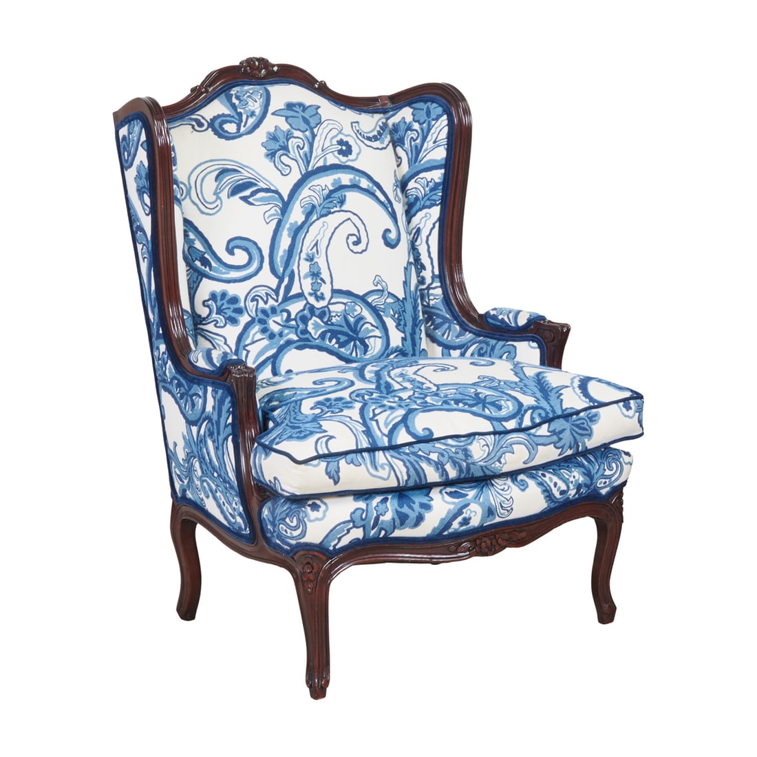 Louis XV Style Bergere a Oreilles with Needlepoint Upholstery: Louis XV Style Bergere a Oreilles with Needlepoint Upholstery, the stained chair frame with shallow carved floral and foliate motifs to top of chair back, and to skirt below skirt, over cabriole legs.