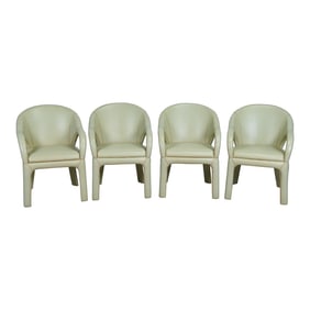 Four Modern Pale Green Leather Arm Chairs