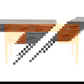 McGuire Bamboo and Oak Desk: McGuire Bamboo and Oak Desk, three shallow drawers over two deeper drawers to sides, gilt brass handles. ;MCGUIRE over SAN FRANCISCO; to center drawer. {Approximate dimensions: 30; H,. x 51 /34' W