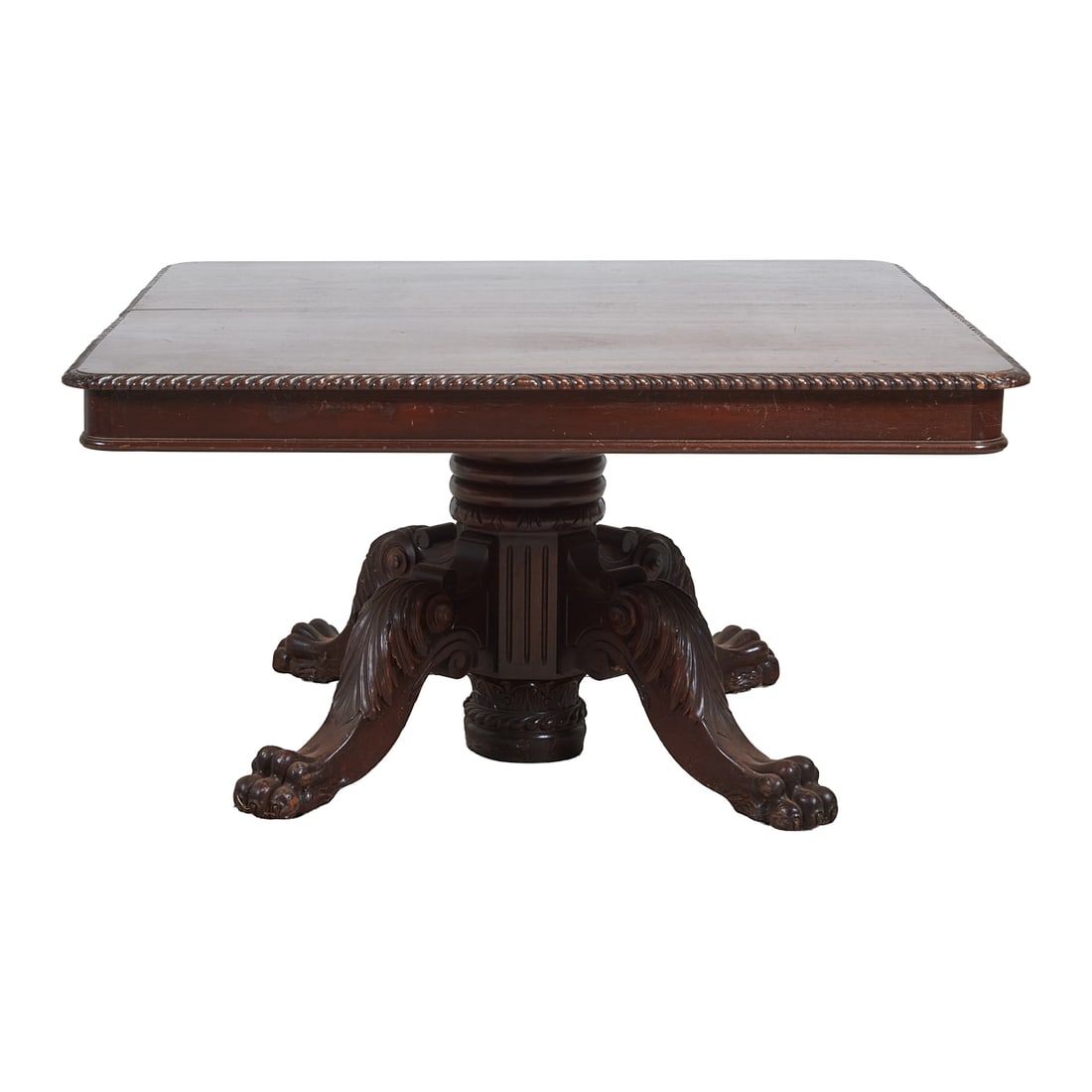 American Empire Mahogany Dining Table: American Empire'Mahogany Dining Table, central pedestal terminating in'four bold claw feet. Includes six leaves in wooden storage rack. Circa 1850. {Approximate dimensions:' 29 3/4" high x 54" wide an