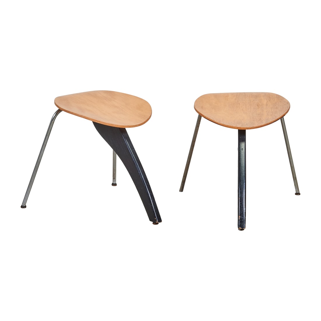 Two Eames for Evans Molded Plywood Stools: Two Eames for Evans Molded Plywood Stools, the molded birch plywood seats on chrome U shaped bases; in lieu of the third chrome leg, a black painted "Rudder" in the manner of Isamu Noguchi, Rudder Sto