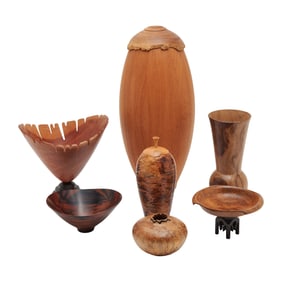 Seven Dennis Stewart Turned and Carved Vessels
