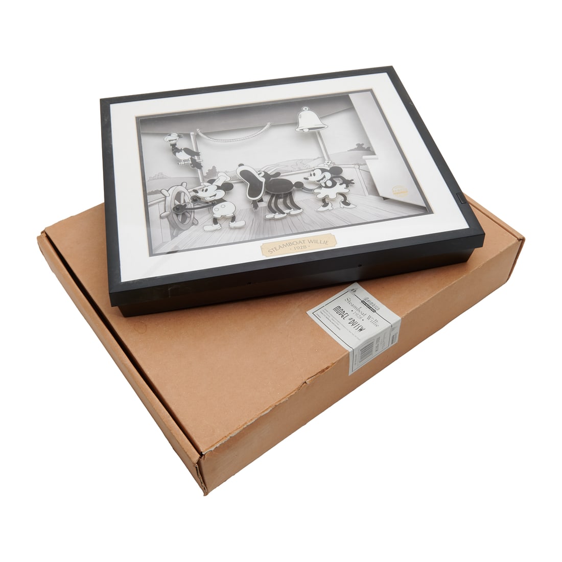 Walt Disney Studios, Steamboat Willie, Animated Cel: WALT DISNEY STUDIOS (1923-present), a scene from Steamboat Willie (1928), featuring a 3D animated celluloid display with background, model #DY1SW, plates and screens printed in 1998,'[approximate dime