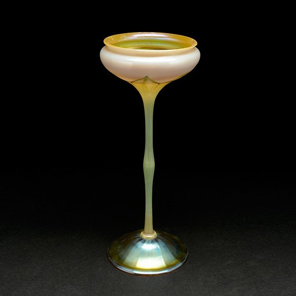 Tiffany Studios Pulled Feather Compote: Tiffany Studios Pulled Feather Compote. The upper round flared section in an ivory background is decorated by a green pulled feather design originating at the bottom of the slender shaft where it join