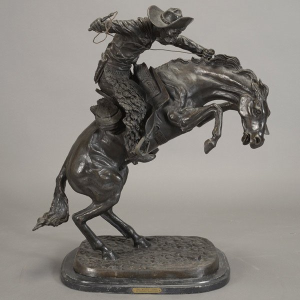 Frederic Remington Bronze "The Wooly Chaps": FREDERIC REMINGTON (American 1861-1909) "The Wooly Chaps" Bronze. 32 x 28 x 13 inches/ 81.3 x 71.2 x 33 centimeters not including base. Signed lower right "Frederic Remington"