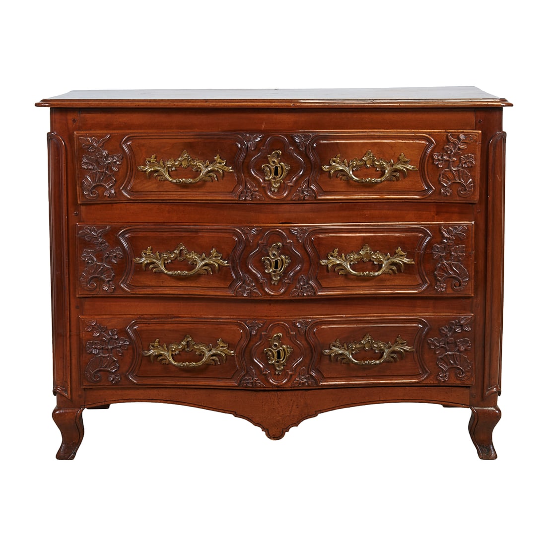 Louis XVI Style Carved Walnut Commode: Louis XVI Style Carved Walnut Commode, serpentine top and front, carved elements to sides of drawers. {Approximate dimensions: 41 1/4" high x 53 3/4" wide x 30" deep.}.