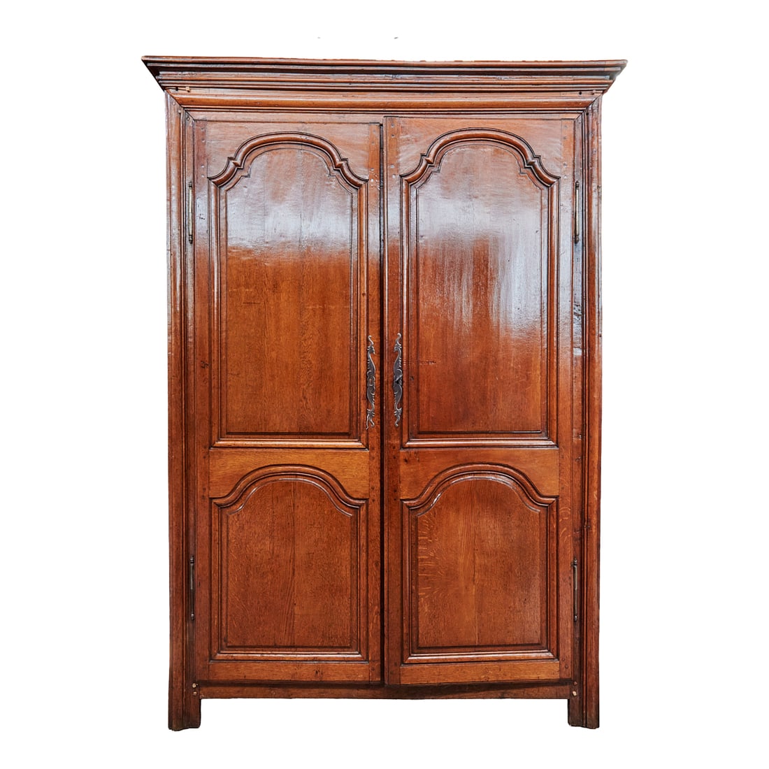 French Provincial Walnut Armoire: French Provincial Walnut Armoire, the crest over two doors, and various interior shelves; the doors with bas relief carved arches and panels. {Approximate dimensions: 91 1/4" high x 65" wide x 27 1/2"