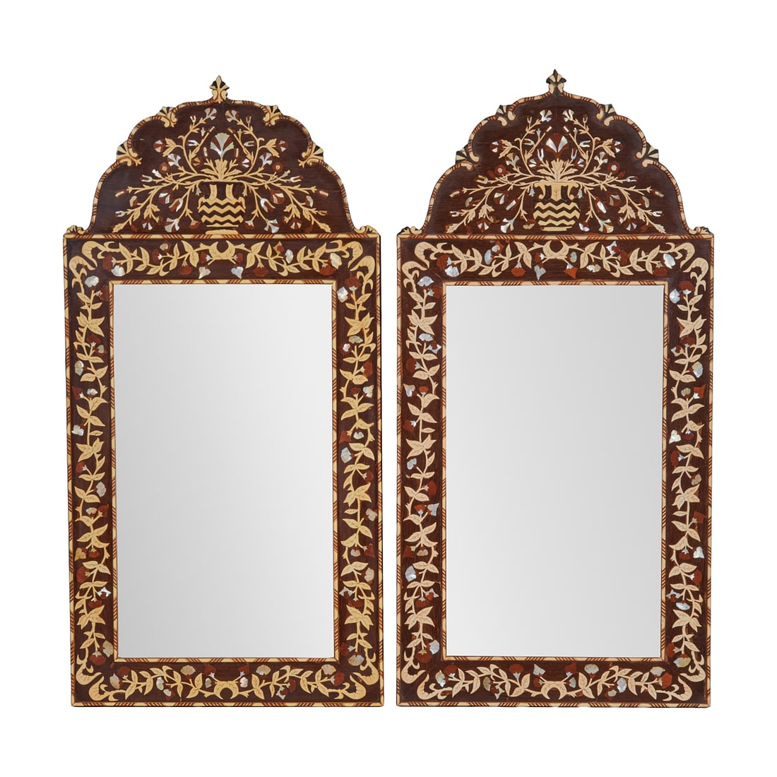 Pair of Iberian Style Inlaid Mirrors: Pair of Iberian Style Inlaid Mirrors, carved and inlaid arched crests over rectangular frames, the whole with gilt foliate appliquees and bone inlay. {Approximate dimensions: 47 5/8" H. x 23 1/2" W.}.