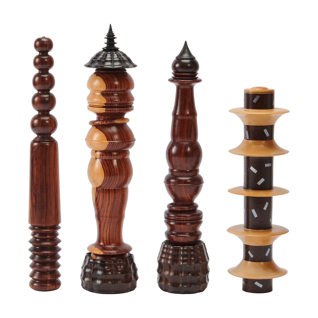 Four Turned and Carved Rod Form Vessels: Four Turned and Carved Rod Form Vessels, including a segmented vessel of maple, wenge, paint, by Addie Draper, and two spinning tops and a scent bottle, by Stephen Paulsen, of assorted exotic and comm