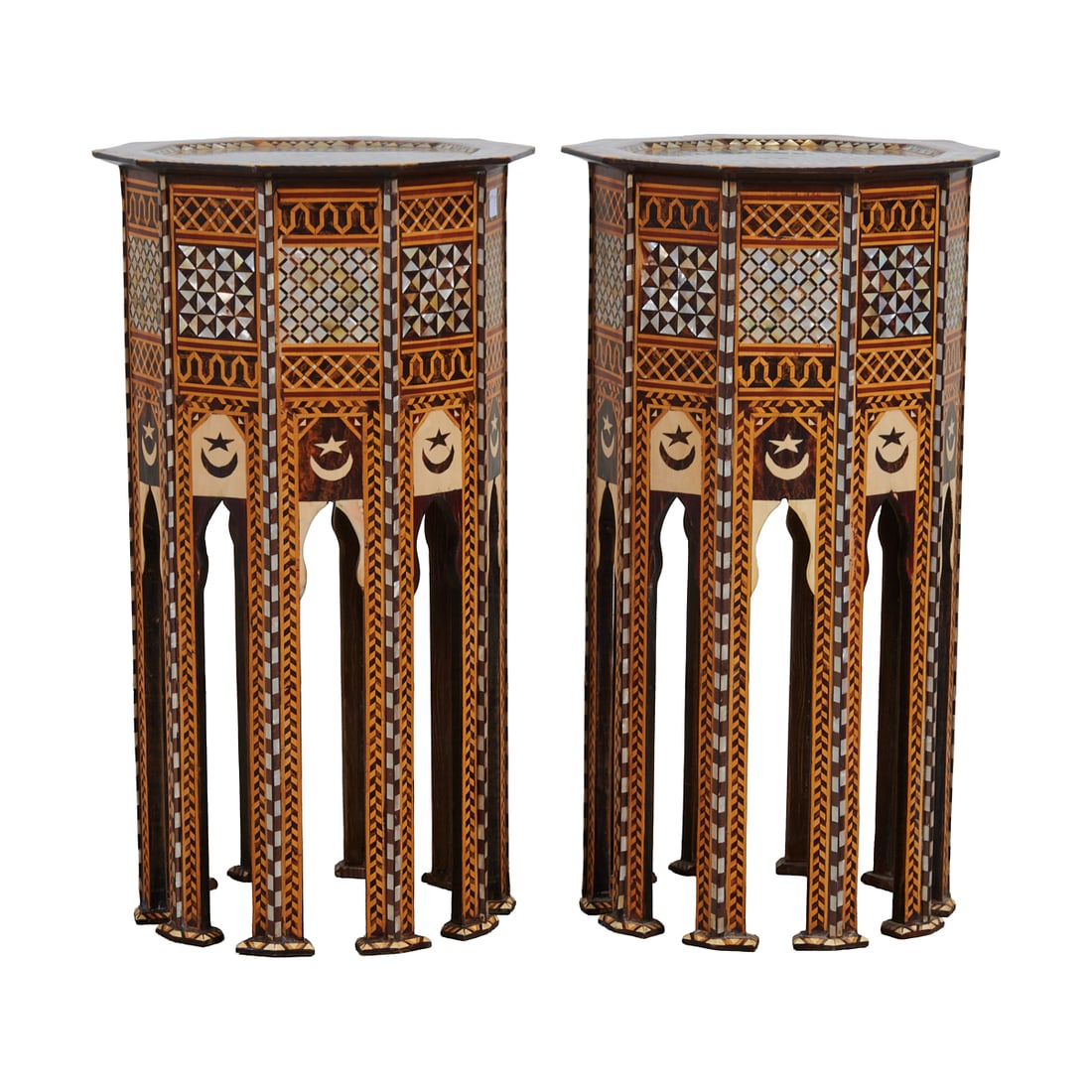 Pair of Moorish Style Inlaid Tables: Pair of Moorish Style Inlaid Tables, decagonal tops, sides, and legs extensively inlaid with mother of pearl, bone, and exotic woods in geometric patterns. {Approximate Dimensions: 29" H x 16.5" Wx 16
