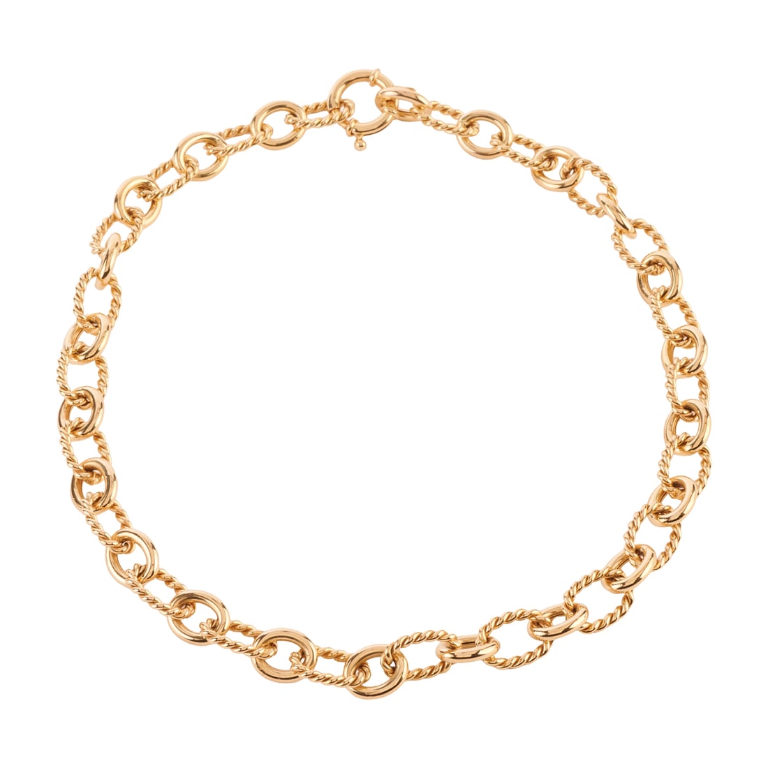 14k Yellow Gold Necklace: 14k Yellow Gold Necklace. The 14k yellow gold polished and fluted open oval links measuring approximately 12 mm in width, completed by a spring ring clasp, forming a 17 1/2 inch necklace. {Gross Weigh