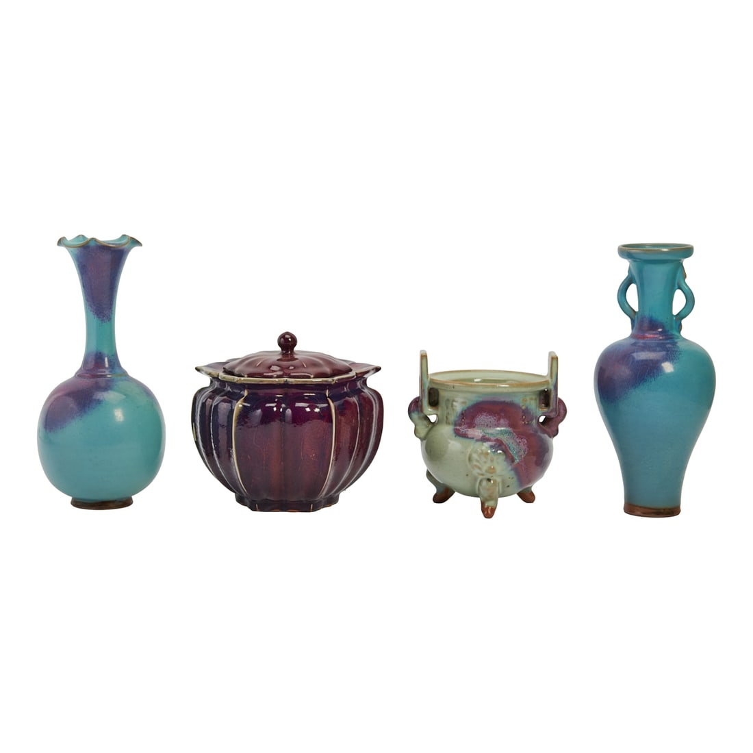 Group of Four Chinese Glazed Porcelain Items: Group of Four Chinese Glazed Porcelain Items.The group includes four porcelain vessels of varied forms, including two vases, a covered jar, and a tripod censer-form vessel. Each piece is glazed in blu