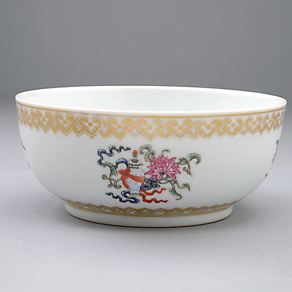 A Gilt-Decorated Famille Rose Bowl, Daoguang Mark: A Gilt-Decorated Famille Rose Bowl, The shallow bowl painted to the body with the bajixiang, the eight Buddhist emblems, with two gilt-painted ruyi-head bands by the mouth and foot rims, the blue six-