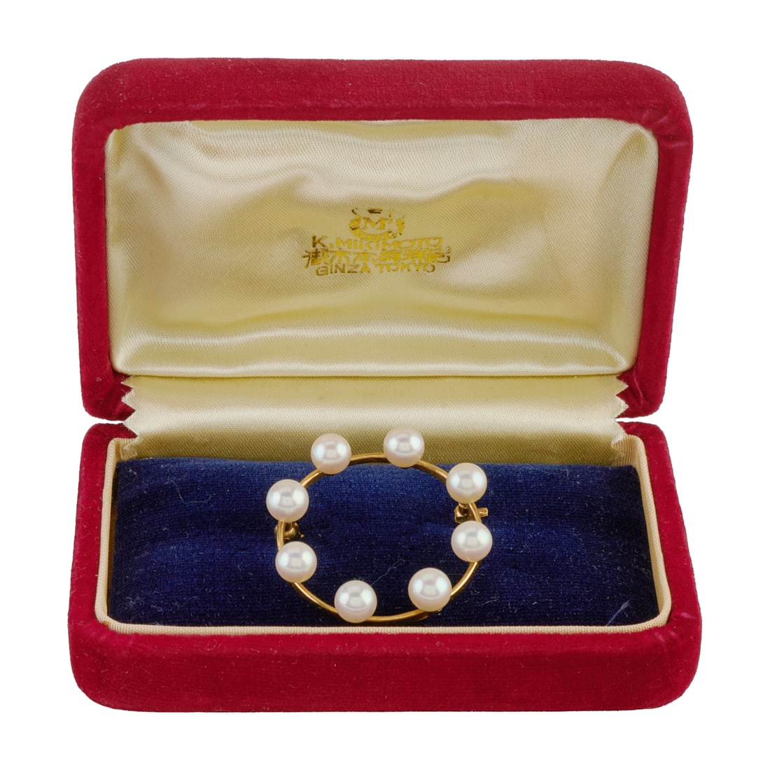 Mikimoto Cultured Pearl, 14k Yellow Gold Circle Brooch: Mikimoto Cultured Pearl, 14k Yellow Gold Circle Brooch. Featuring eight cultured pearls measuring approximately 5.5 mm, set on a 14k yellow gold circle mounting measuring approximately 33 mm.
