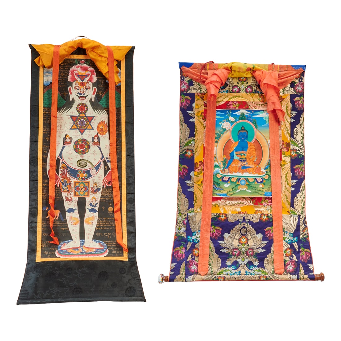 Two Tibetan Painted Thangka Scroll, 20th Century: Two Tibetan Painted Thangka Scrolls, 20th Century.Comprising one thangka depicting a full-length anthropomorphic figure associated with tantric body symbolism, extensively inscribed and painted with