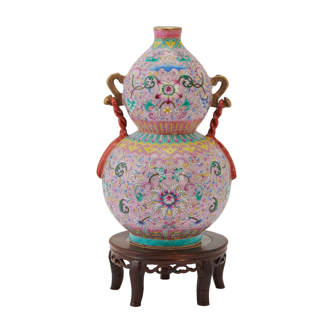 Chinese Famille Rose Porcelain Double Gourd Vase on Stand: Chinese Famille Rose Porcelain Double Gourd Vase on Stand. The porcelain vase is modeled in a double-gourd form, supported on a fitted wood stand. The exterior is decorated overall in famille rose ena