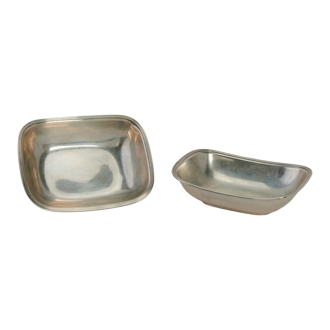 Pair of Tiffany and Co Sterling Silver Open Serving Dishes: Pair of Tiffany and Co Sterling Silver Open Serving Dishes. Featuringrounded rectangular shape, four sides tapering to dish center, three banded border, and low rim foot Marked to underside with