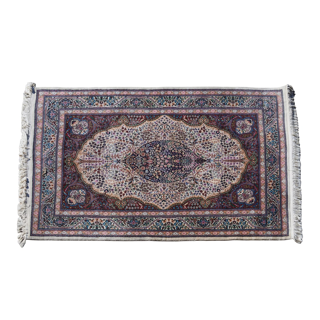 Persian Wool and Cotton Stylized Tree of Life Rug: Persian Wool and Cotton Stylized Tree of Life Rug, woven with central off white medallion enclosing a blue medallion, and with dense flowerheads issuing from trees to center left and right, with