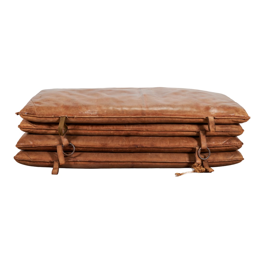 Four Vintage Leather Wrestling Mats: Four Vintage Leather Wrestling Mats, with overcast stitched edges, each with leather straps, some with rings.{Approximate dimensions: 71 1/4" long x 41" wide x 6" high, with slight variations.}.