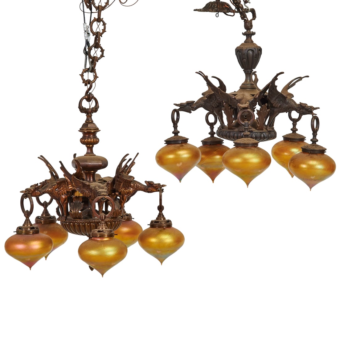 Pair of Japonesque Blackened Metal Five Light Chandeliers: Pair of Japonesque Blackened Metal Five Light Chandeliers,formed as interlocking dragons,their wings upstretched surrounding the central body of the light fixtures,the dragons with rings from the