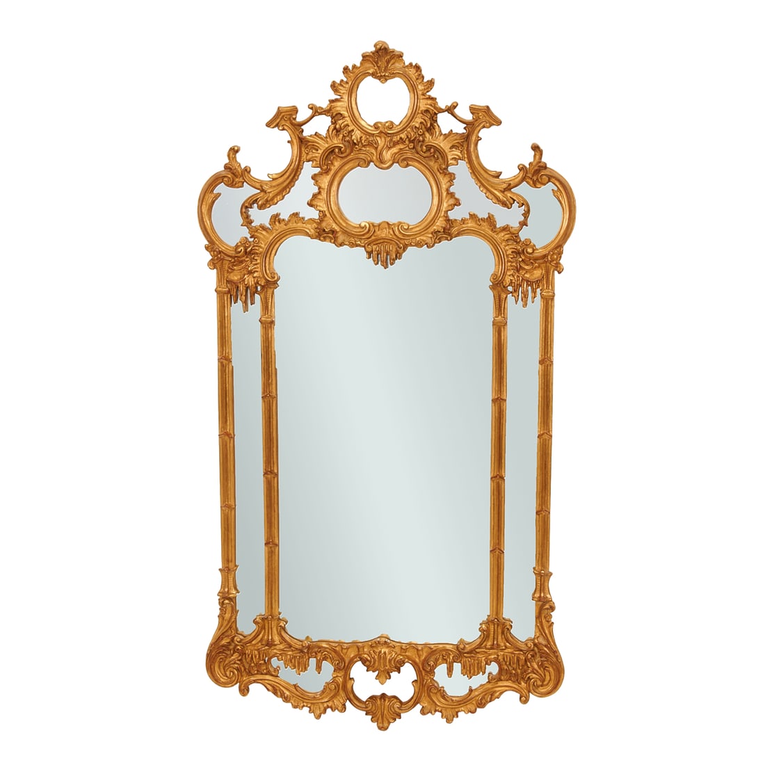 Rococo Style Carved Giltwood and Gesso Wall Mirror: Rococo Style Carved Giltwood and Gesso Wall Mirror. By Carver's Guild "Chippendale" design, of Rectangular central plate, with scroll and foliate crest, the bottom with mirrored elements, and