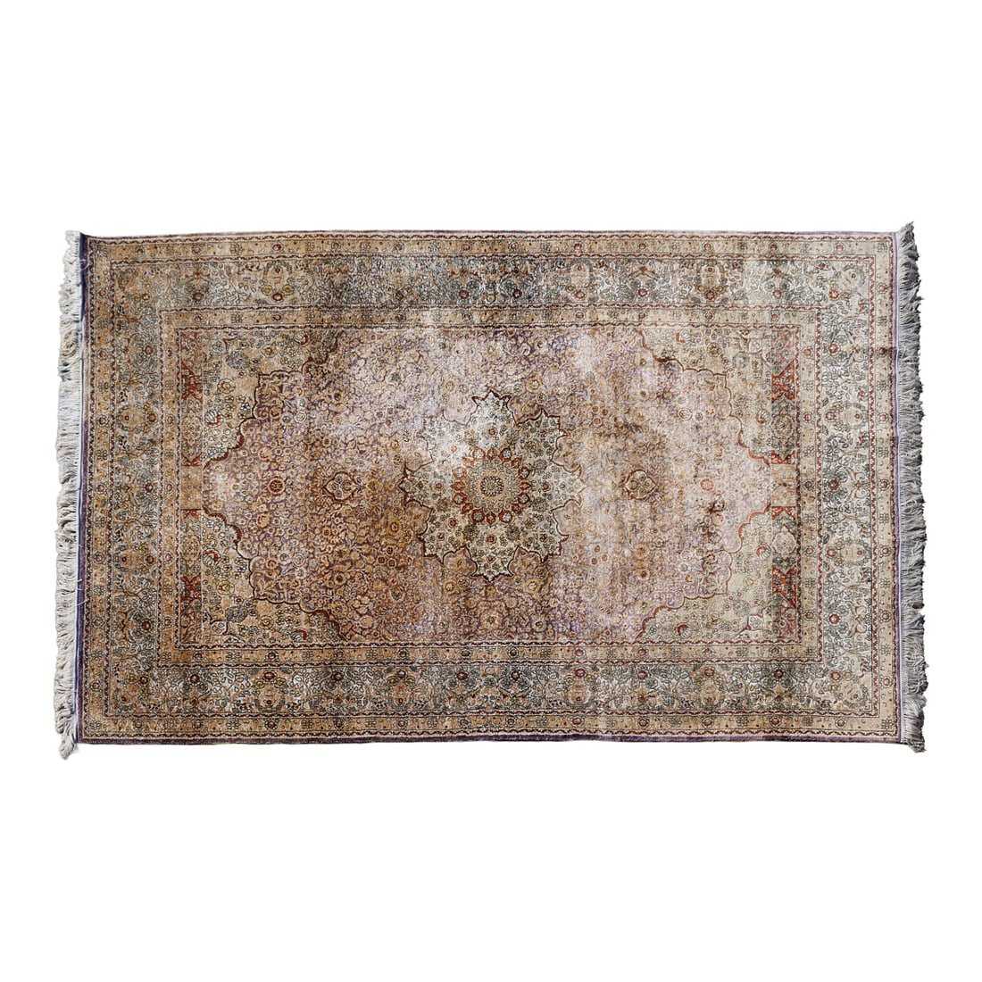 Persian Silk and Cotton Carpet: Persian Silk and Cotton Carpet, woven in shades of purple, ocher, green, off white, brown and red with a large central medallion and copious stylized foliate and geometric motifs{Approximate