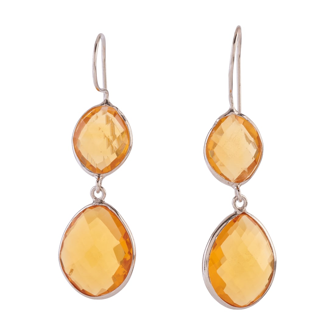 Pair of Citrine, Sterling Silver Earrings: Pair of Citrine, Sterling Silver Earrings. Each featuring two slightly graduated, oval shaped, faceted citrines, bezel set in a sterling silver mounting measuring approximately 56 mm in length.