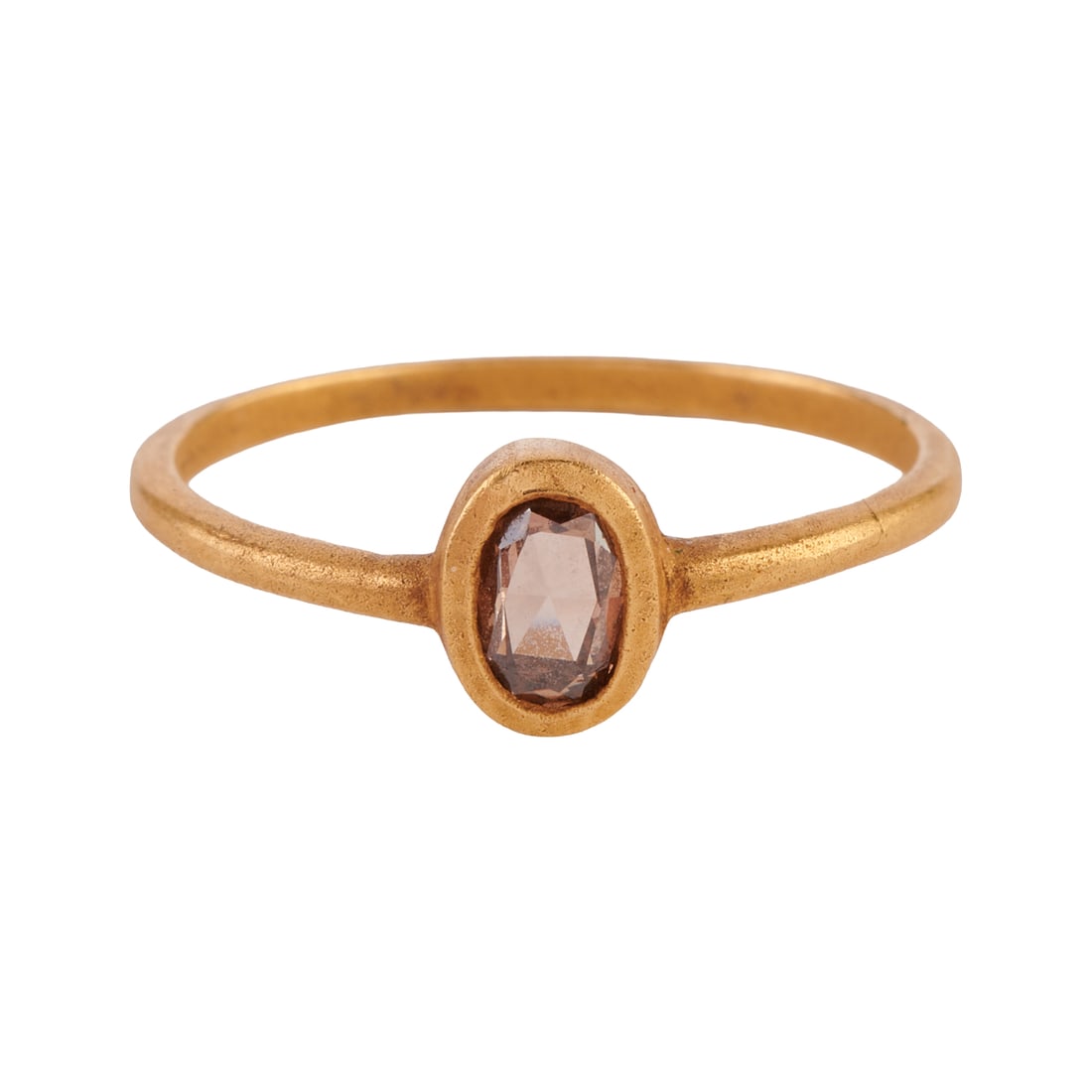 Brown Diamond, 18k Yellow Gold Ring: Brown Diamond, 18k Yellow Gold Ring. Featuring one oval-cut brown diamond weighing approximately 0.20 ct., bezel set in an 18k yellow gold matte mounting. {Size: 6 1/4, Gross Weight: 1.0 dwts}