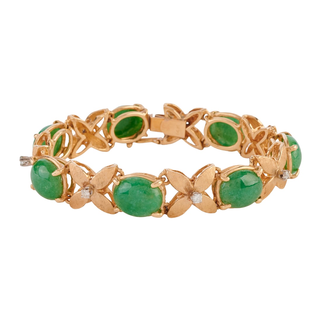 Jade, Diamond, 14k Yellow Gold Bracelet: Jade, Diamond, 14k Yellow Gold Bracelet. Featuring seven oval shaped jade cabochons measuring approximately 12 x 10 mm, interspersed by seven full-cut diamonds weighing a total of approximately 0.20